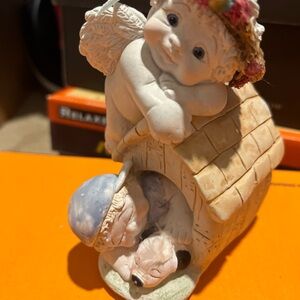 White and Tan Decorative Figurine with Floral Accents